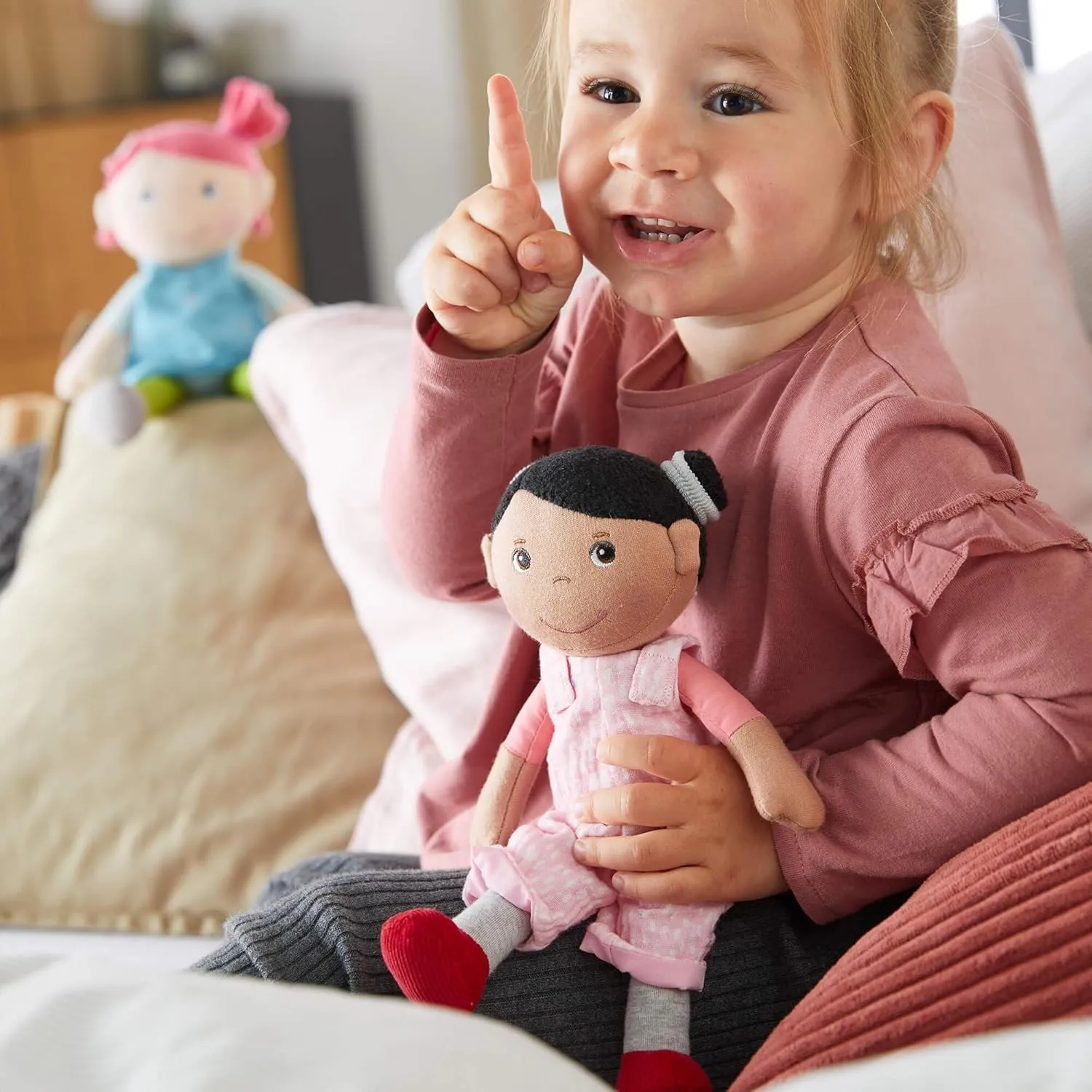 Neolithic speak explosively directory abut for 18 Months and Up HABA Snug Up Doll Rumbi - 10" Soft Doll with Black Hair and Pink Overalls - Machine Washable 