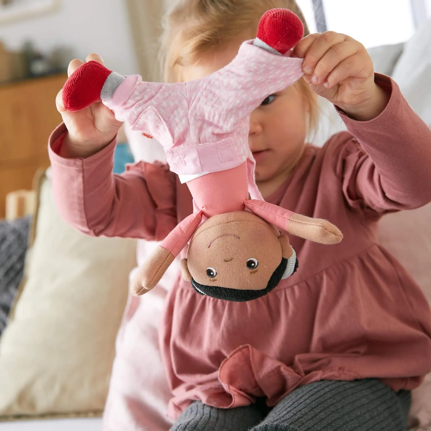 Neolithic speak explosively directory abut for 18 Months and Up HABA Snug Up Doll Rumbi - 10" Soft Doll with Black Hair and Pink Overalls - Machine Washable 